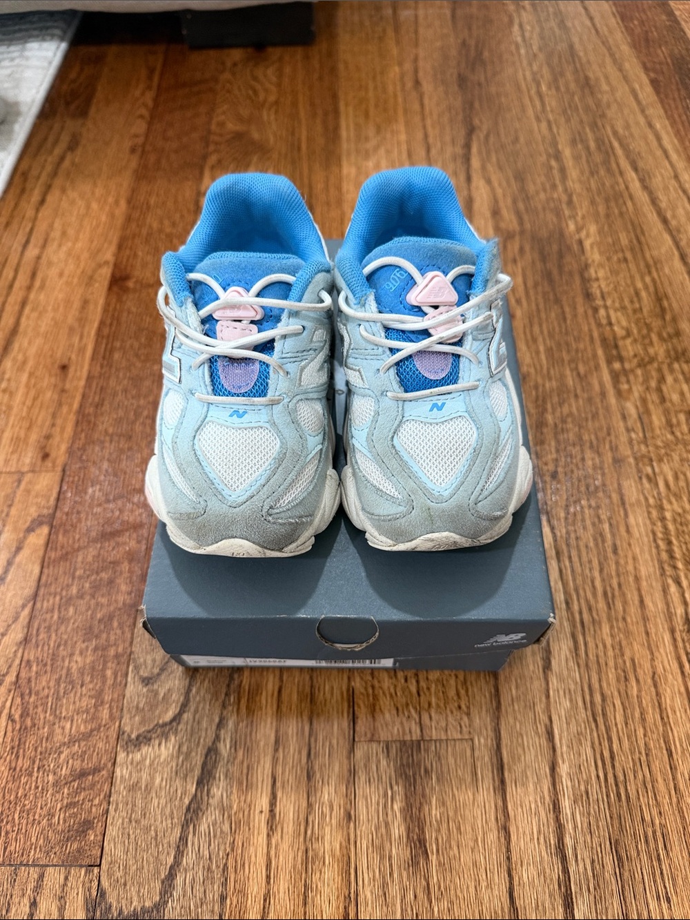 New Balance Kids Light Blue Athletic Sneakers with Pink Accents